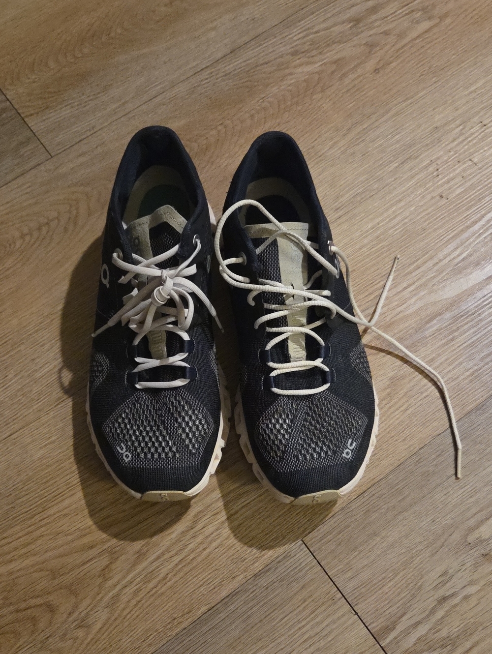 On Running Black and Cream Women’s Athletic Cloud-Style Sneakers